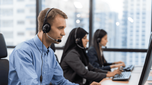 Customer Service team with headsets, responding to calls